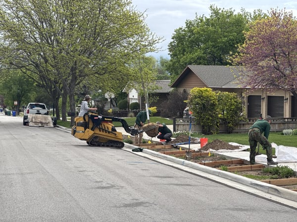 SuperTrees team installing streetscaping, which requires a significant understanding of site conditions